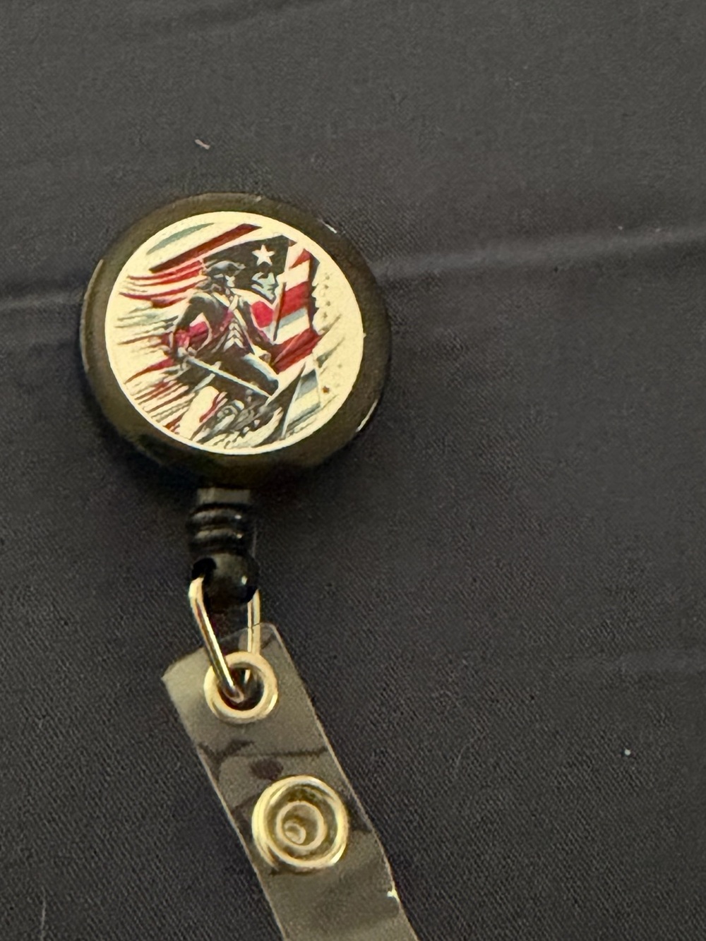 Patriotic American Flag Badge Reel with Soldier Graphic - Black